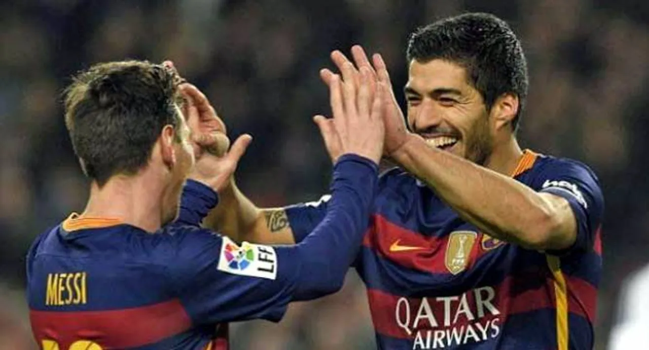 Suarez, Messi hat-tricks hit Neville's Valencia for seven