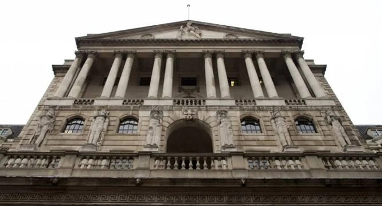 Bank of England cuts UK growth forecasts, holds rates