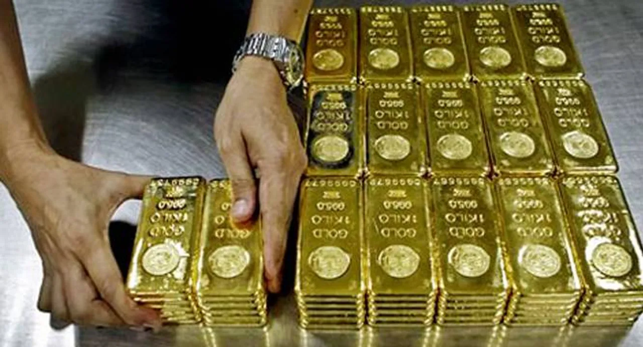 Gold soars to 1-year high on frenzied seasonal demand