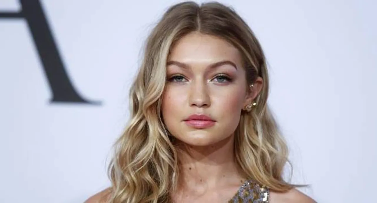 Gigi Hadid poses naked for magazine cover