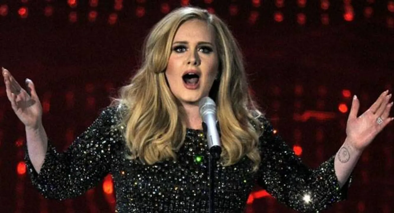 My son makes me very proud of myself: Adele