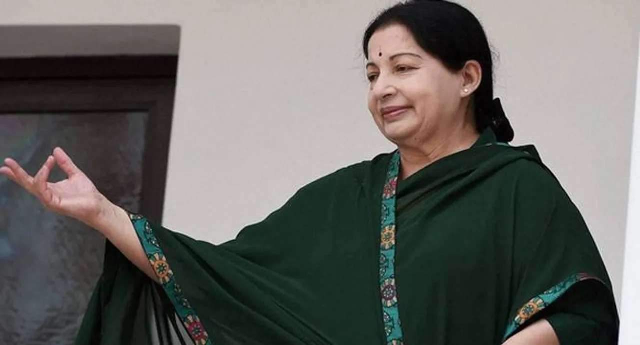Jaya inaugurates infra projects, gives away Amma mobile phones