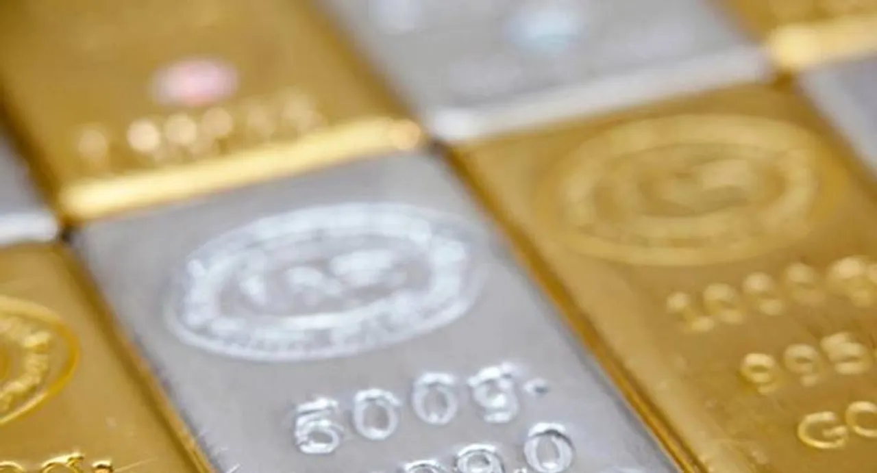 Gold, silver dim on low demand, weak global cues