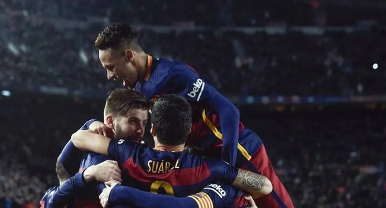 Barca equal unbeaten record in Sevilla win