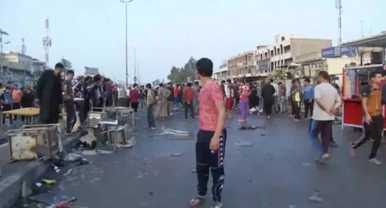 Twin bombing attacks in Baghdad market kill at least 70