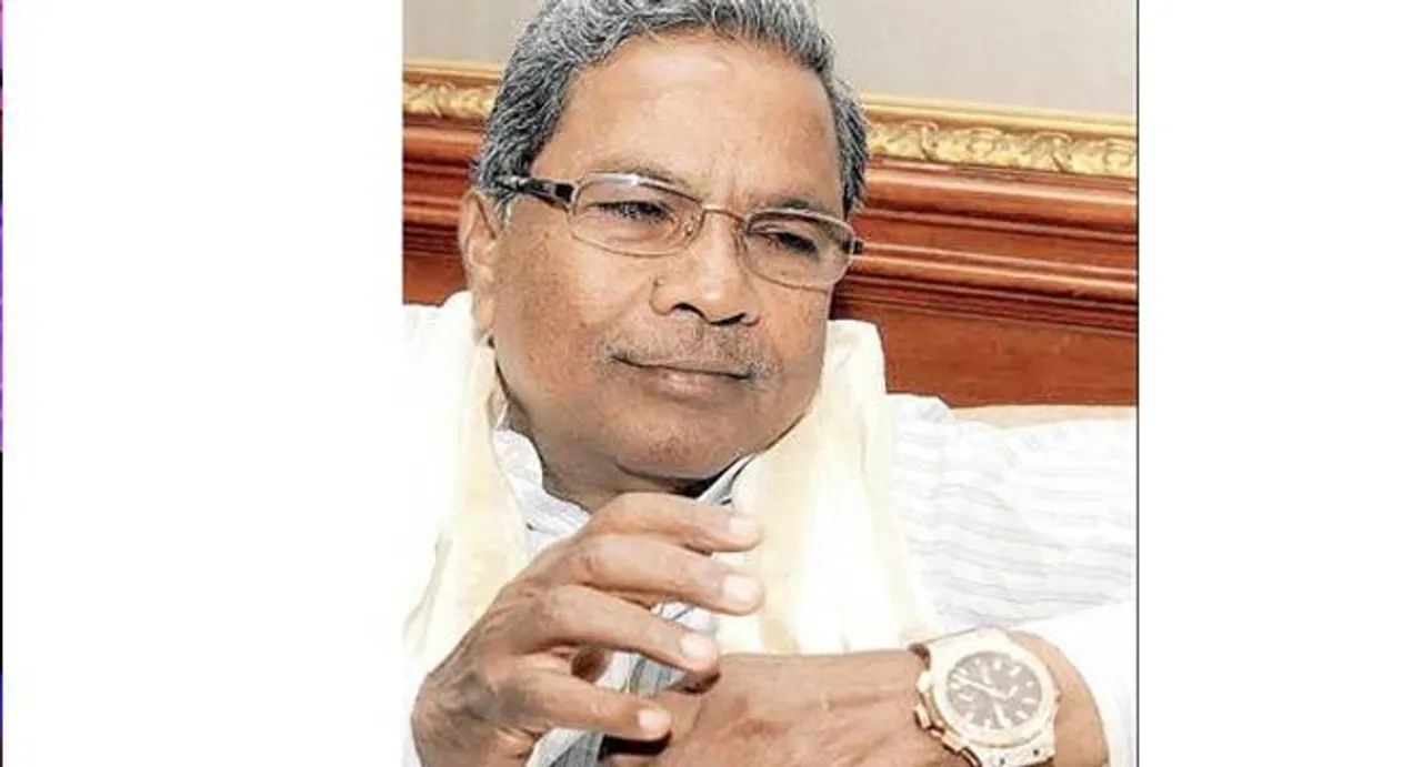 Karnataka CM Siddaramaiah hands over the controversial watch to Assembly Speaker