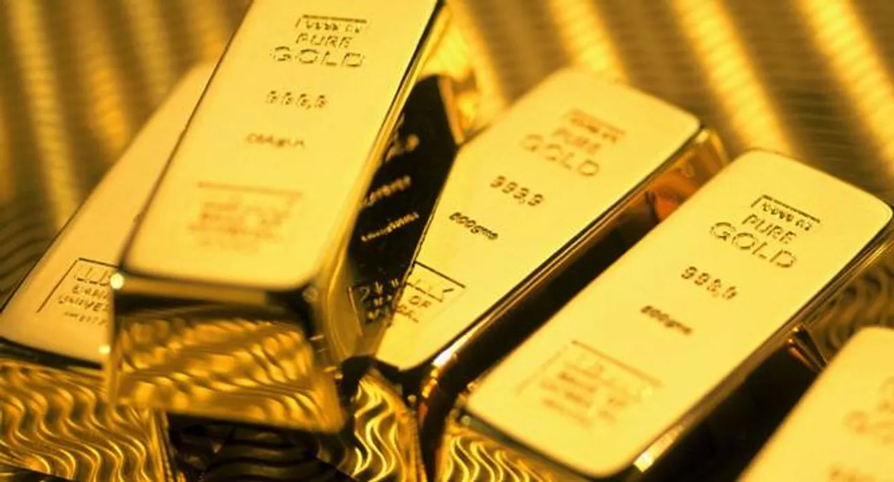 Gold falls Rs 91 in futures trade as weak global cues hurt