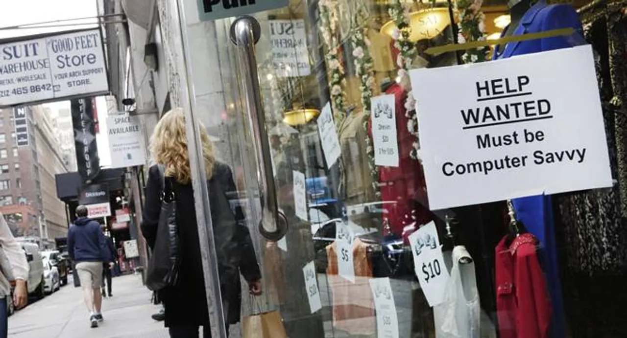 US adds a strong 242,000 jobs; rate holds at low 4.9 pct.