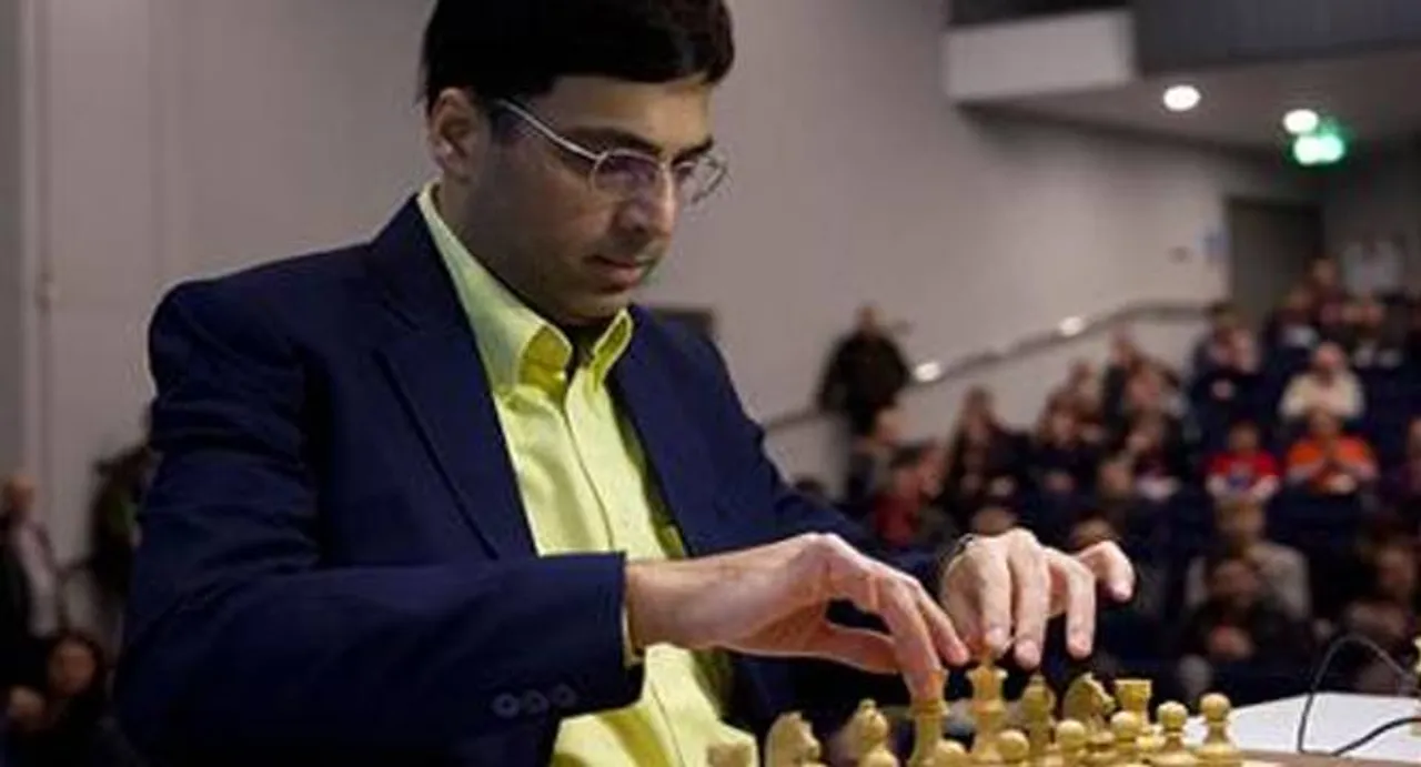 Anand draws with Caruana to stay in joint lead in Candidates