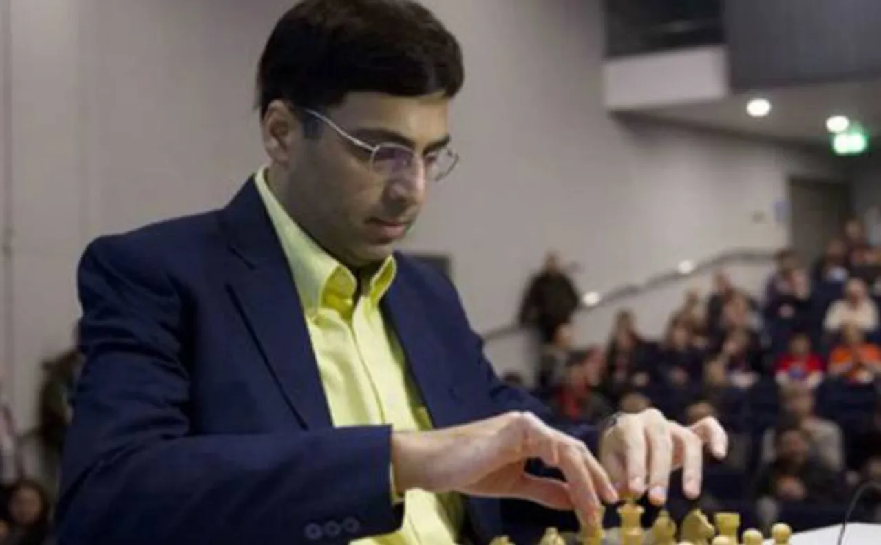 Anand beats Karjakin to come back in joint lead