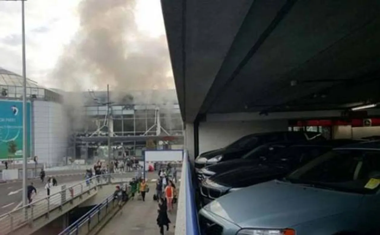 Brussels airport delays reopening, attacks toll lowered to 32
