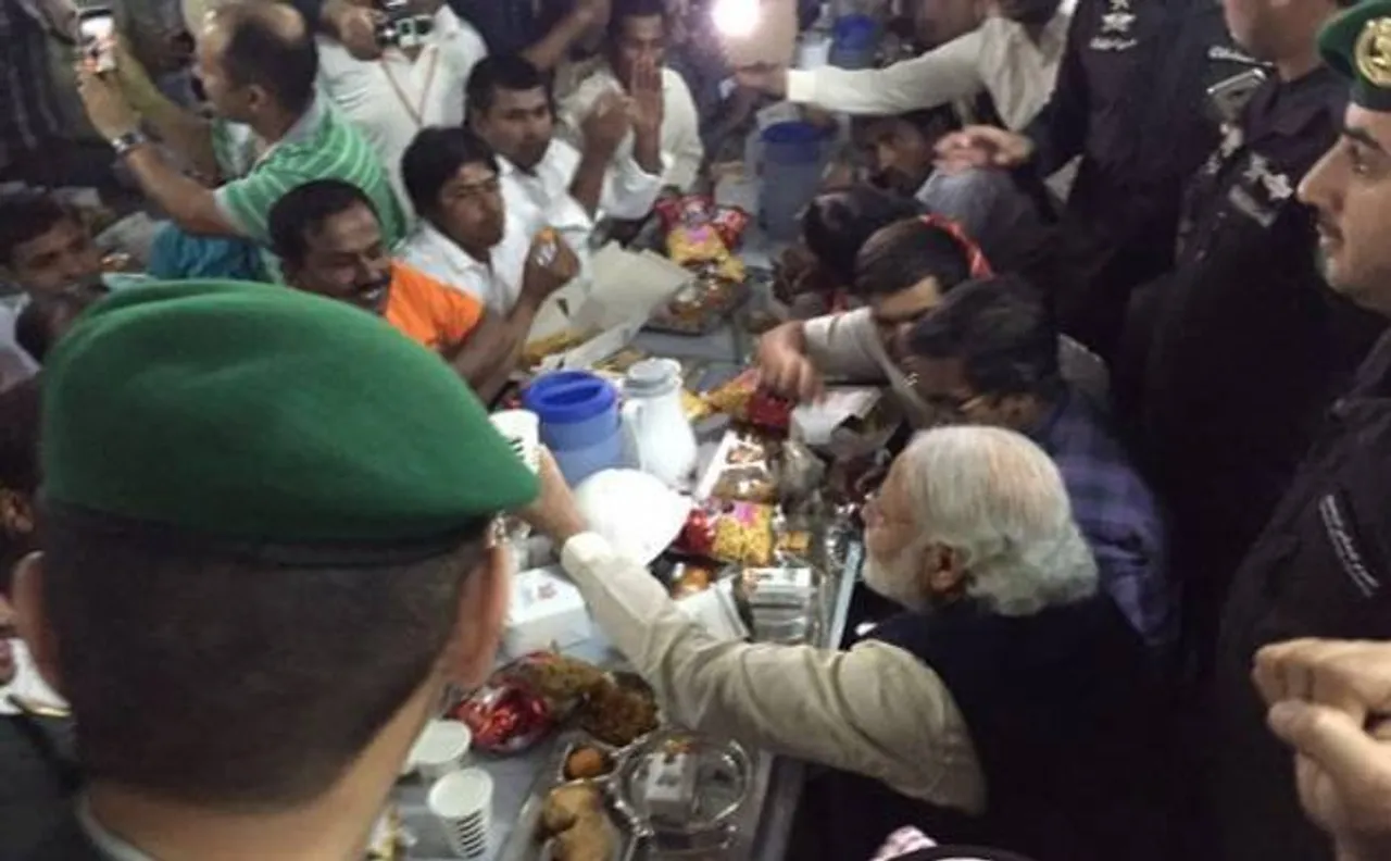 PM Modi breaks bread with Indian construction workers in Saudi Arabia