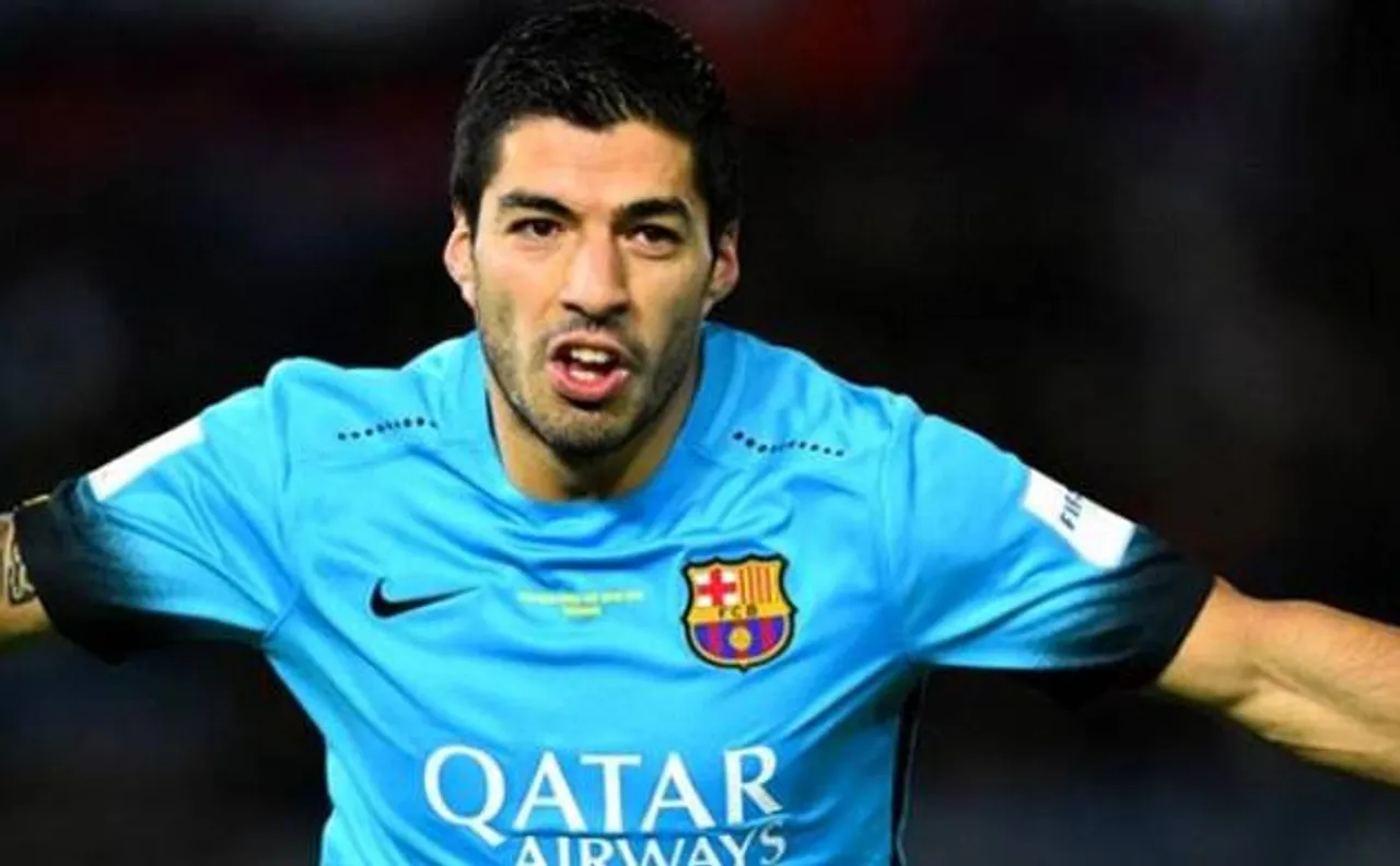 Suarez double salvages Barca against 10-man Atletico
