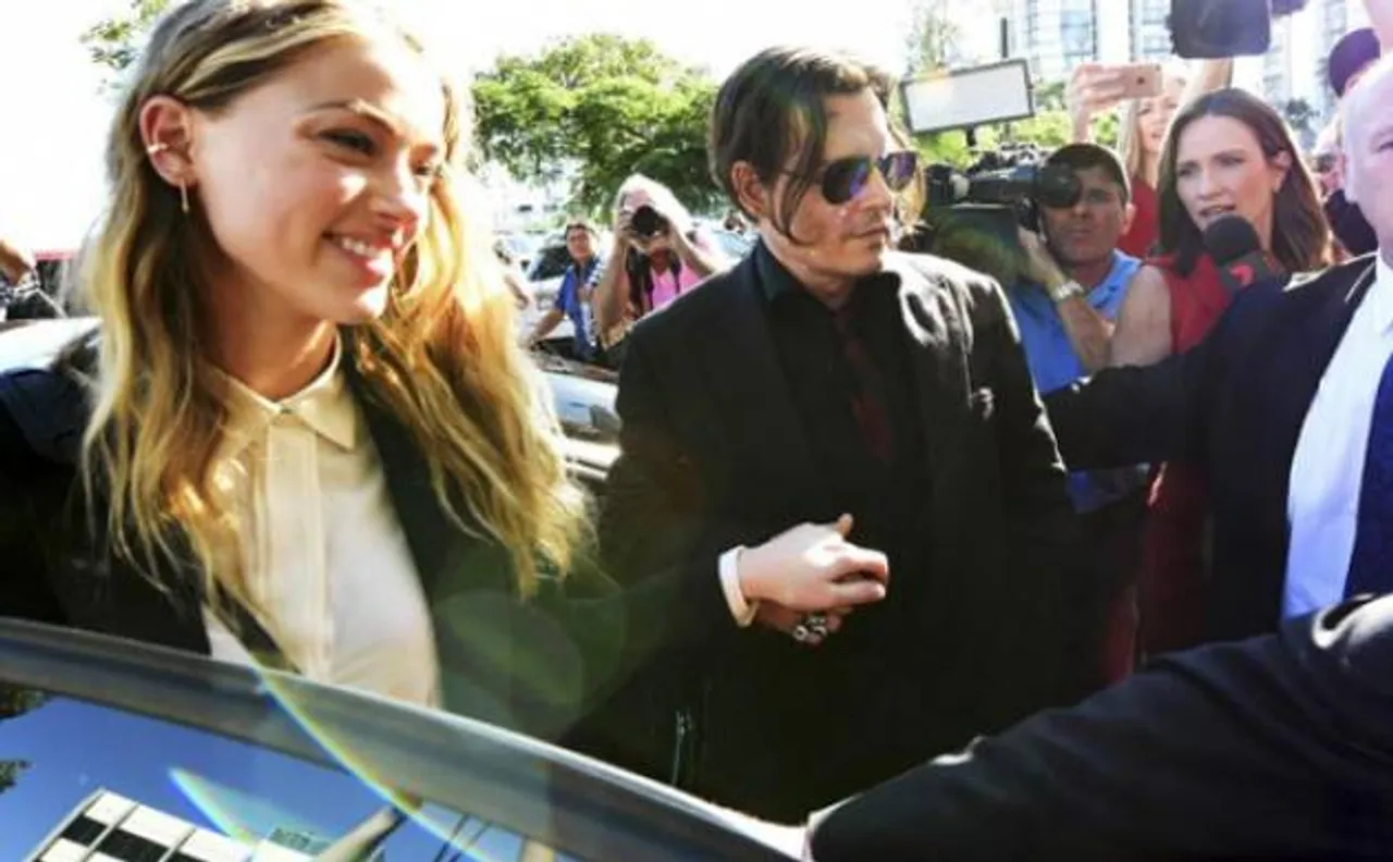 Amber Heard pleads guilty over bringing dogs to Australia