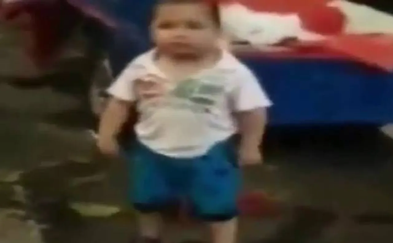 Must Watch: Angry toddler fights for grandmother, dares cops with steel rod