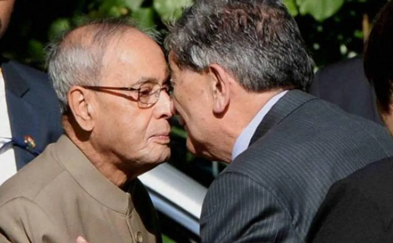 President Mukherjee rubs nose with Maori chief
