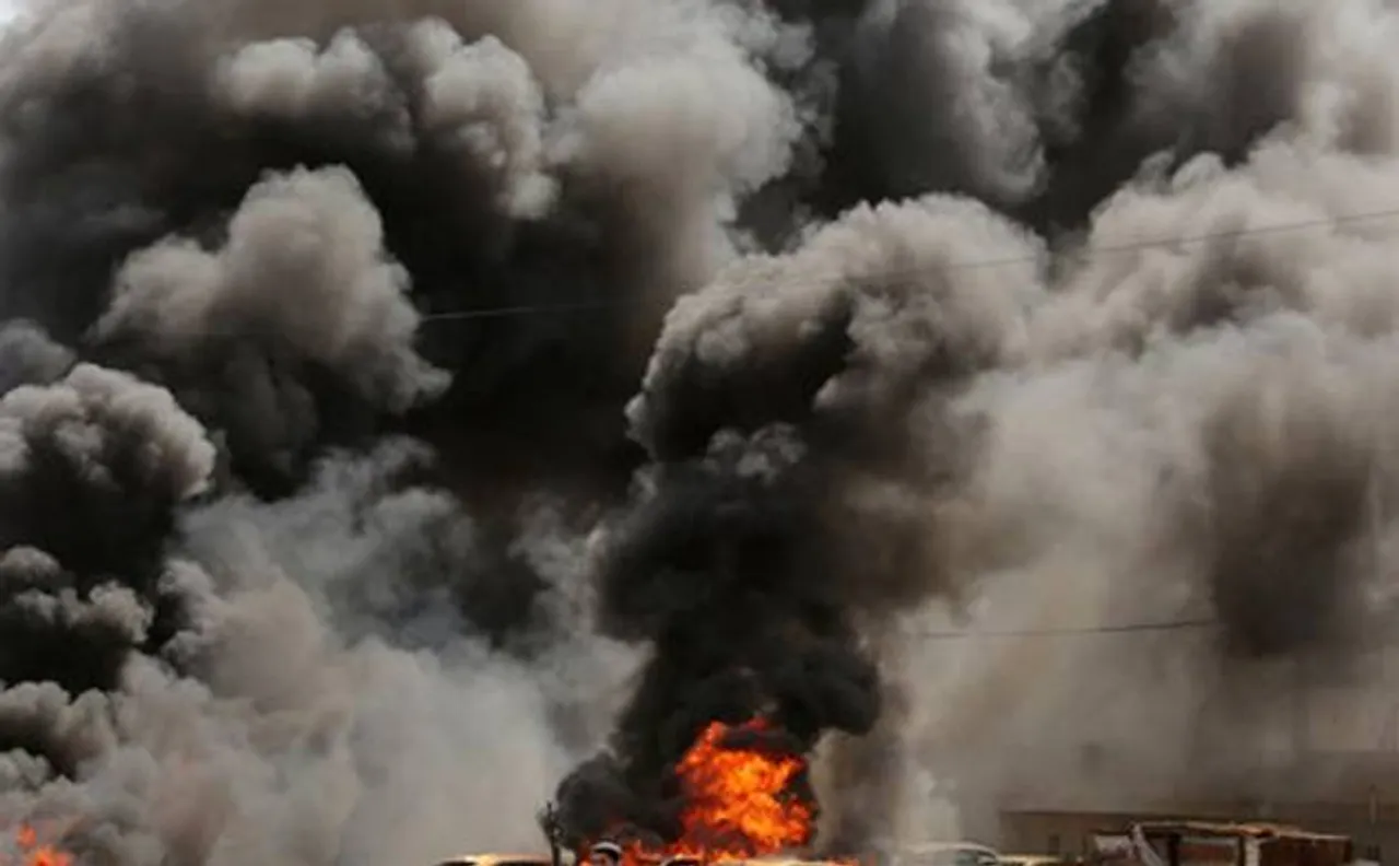 Car bomb blast at a market in Baghdad leaves 34 dead