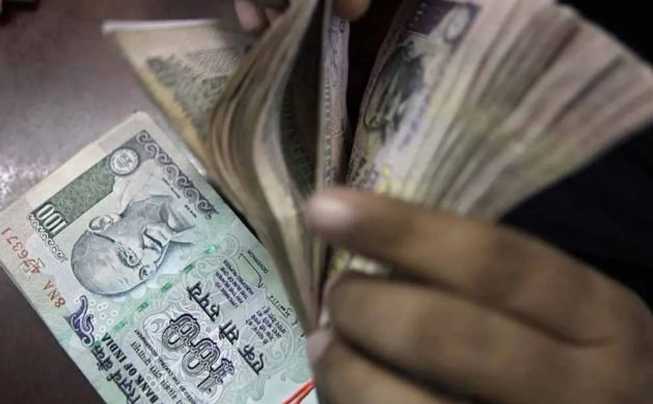 Rupee softens 13 paise against dollar in early trade