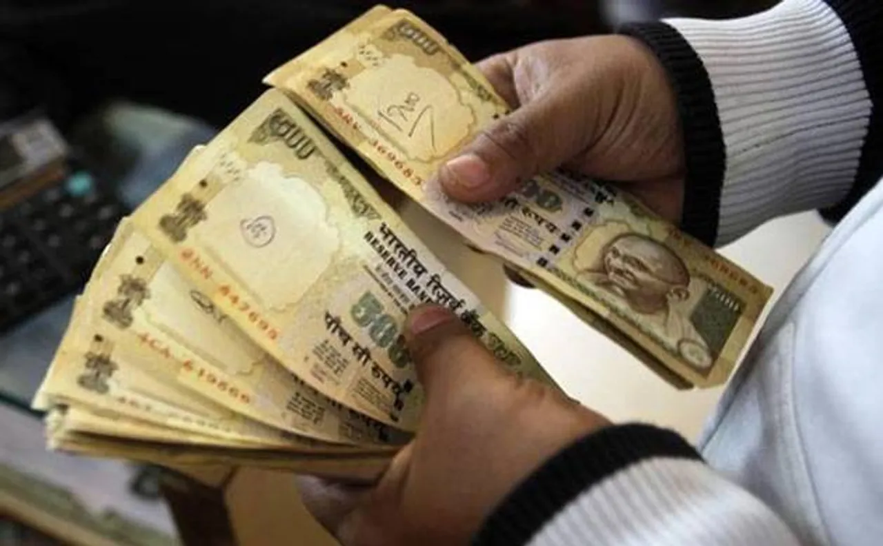Rupee breaches 67-mark, ends 10 paise lower at 66.97
