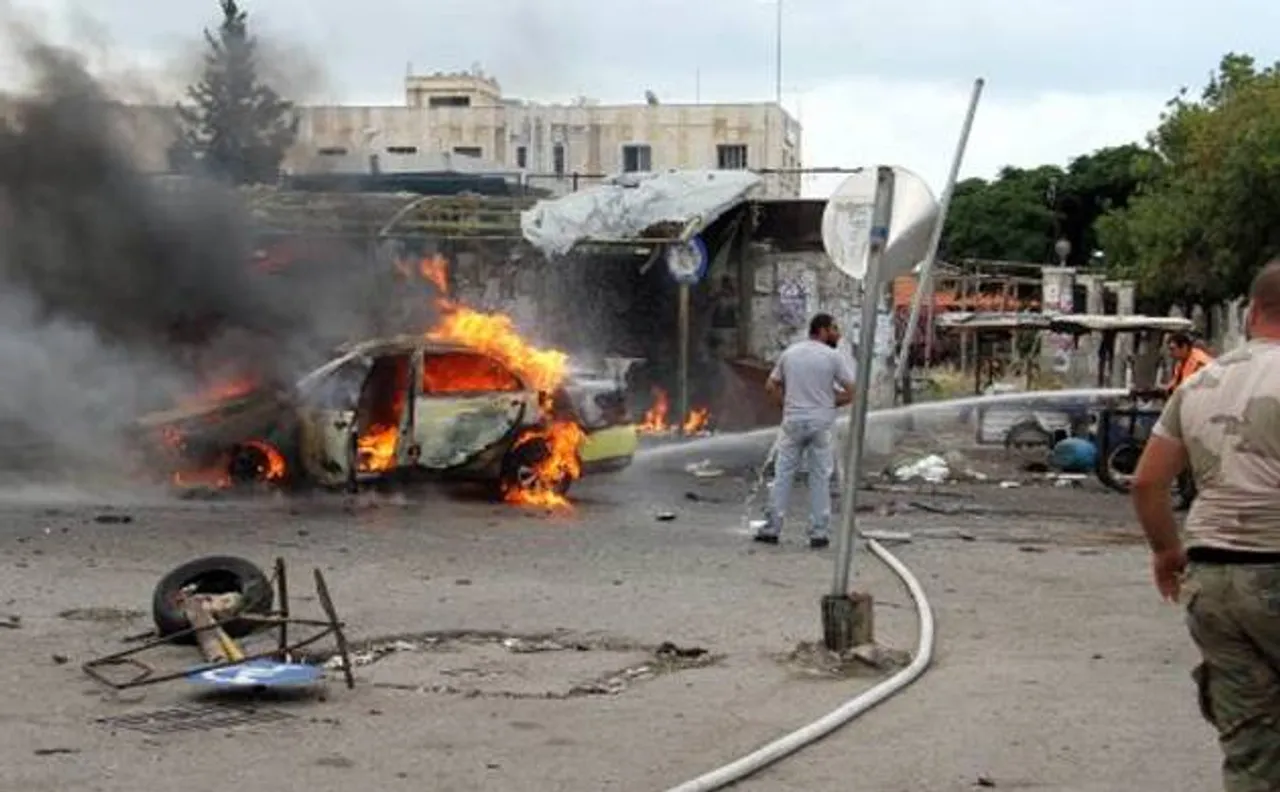 Bombs kill more than 120 in Syria regime bastions 