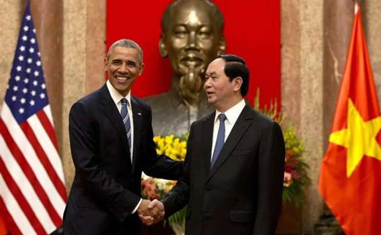 Obama lifts decades-old arms ban in his 1st visit to Vietnam