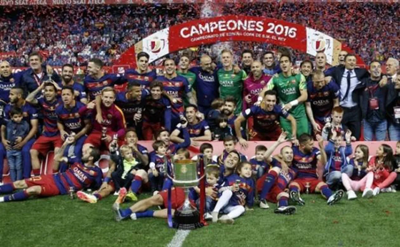 Copa del Rey: Barcelona edge out Sevilla in bad-tempered Cup