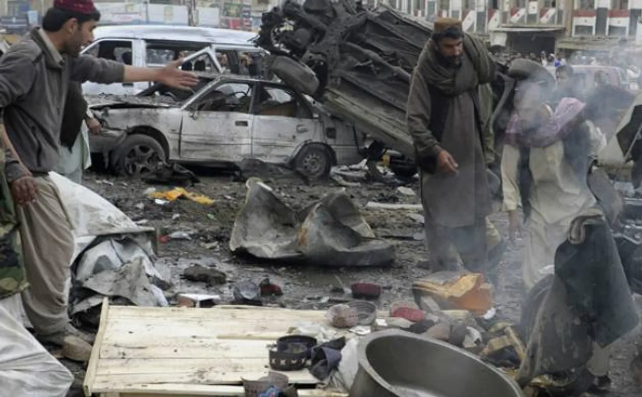 Taliban bomber hits court minibus in Kabul, killing 11
