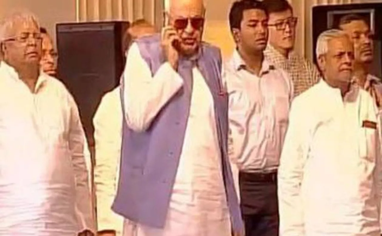 Caught on camera: Farooq Abdullah talking over phone during National Anthem