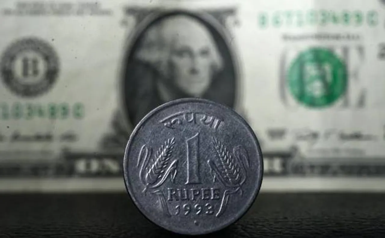 Rupee slips from 1-week high, down 13 paise to 67.16