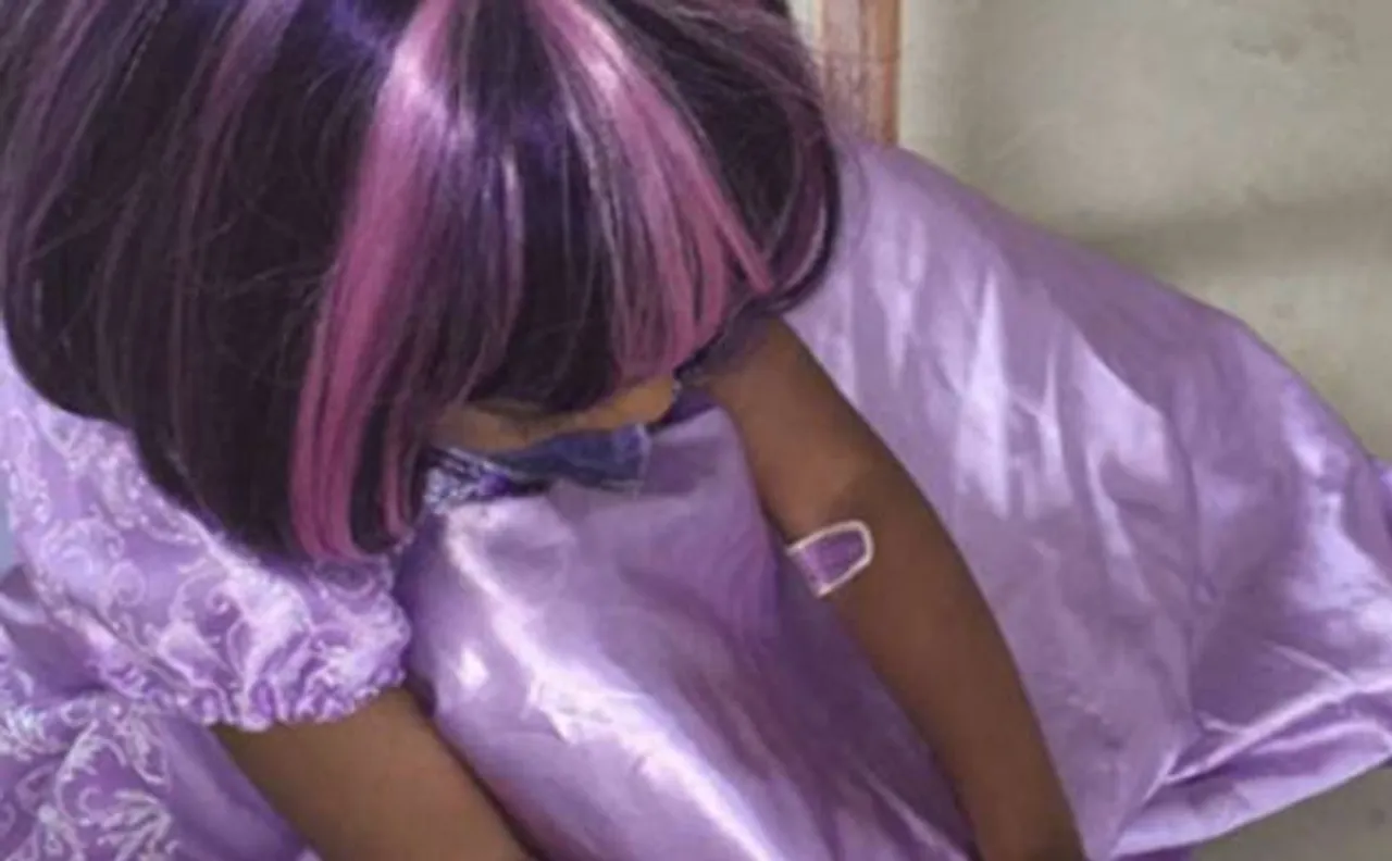 North West channels Littlle Kim in purple wig