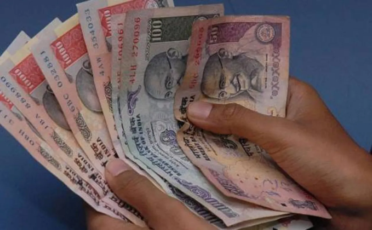Rupee hits 67-mark, tanks 24 paise vs dollar in early trade