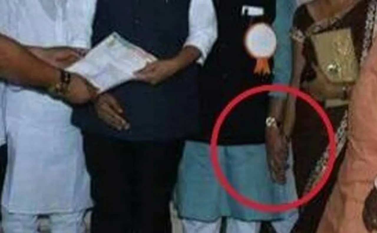 BJP minister's picture holding woman's hand goes viral, case registered against unidentified person