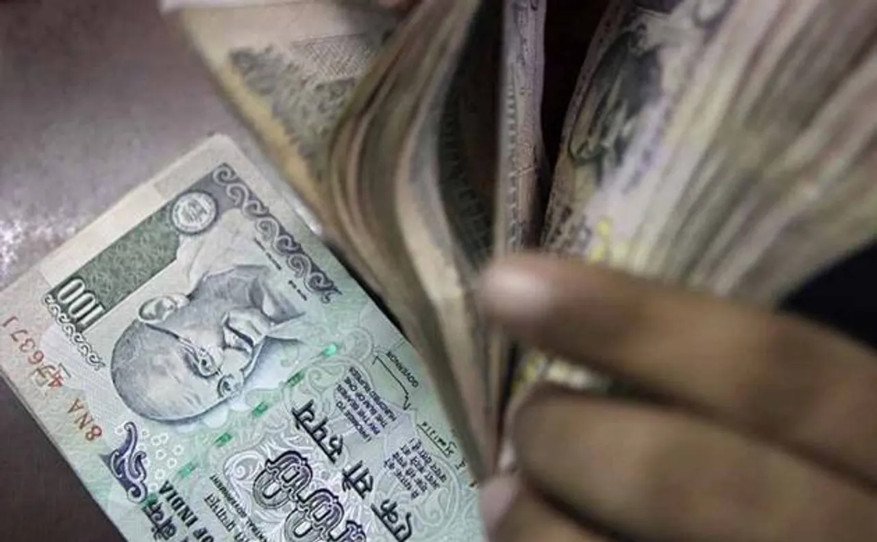 Rupee firms up 14 paise against dollar to 67.54