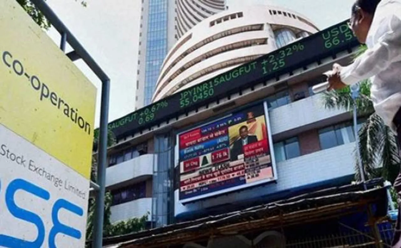 Sensex climbs back into green as RS clears GST Bill