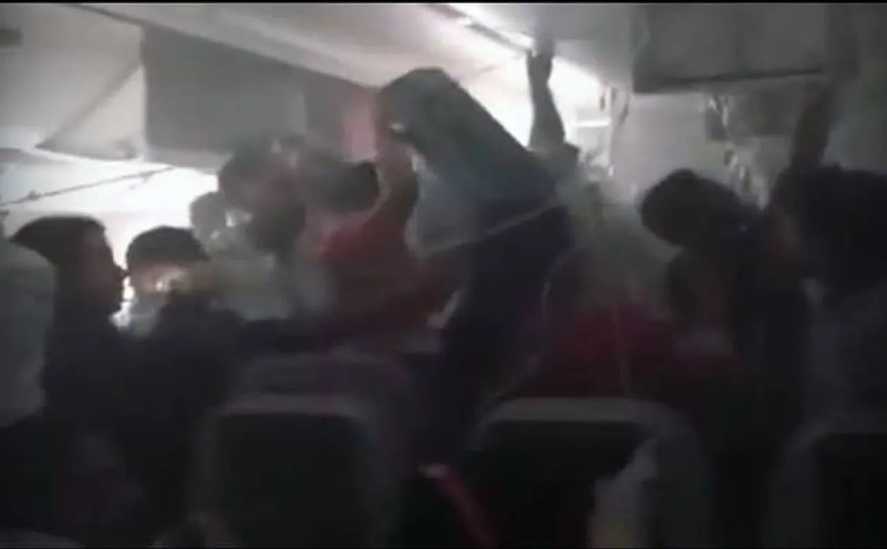 Watch video: Crashed Emirates flight passengers waste time taking bags during evacuation