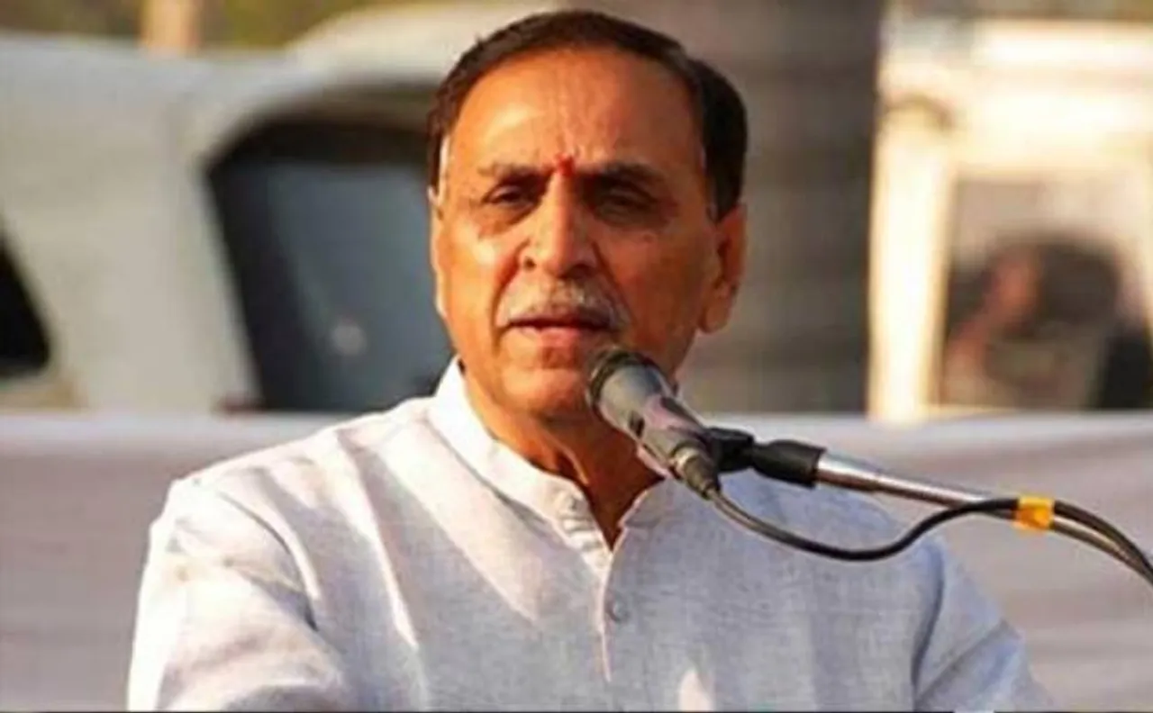 Rupani takes charge; allocates portfolios to ministers