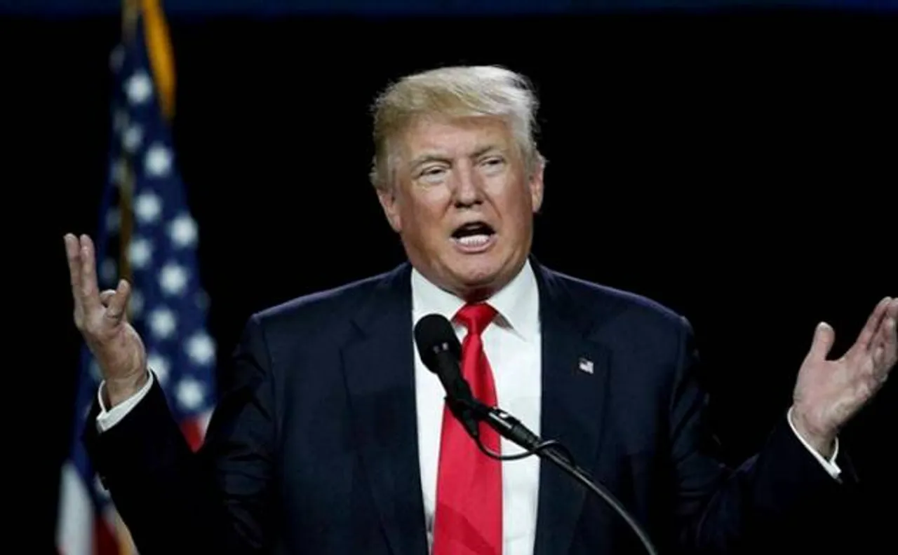 Hillary Clinton team hits report of Donald Trump aide's ties to Russia