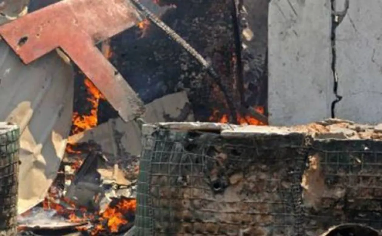 Suicide bombing in Somalia, killing 17 at local government HQ, market