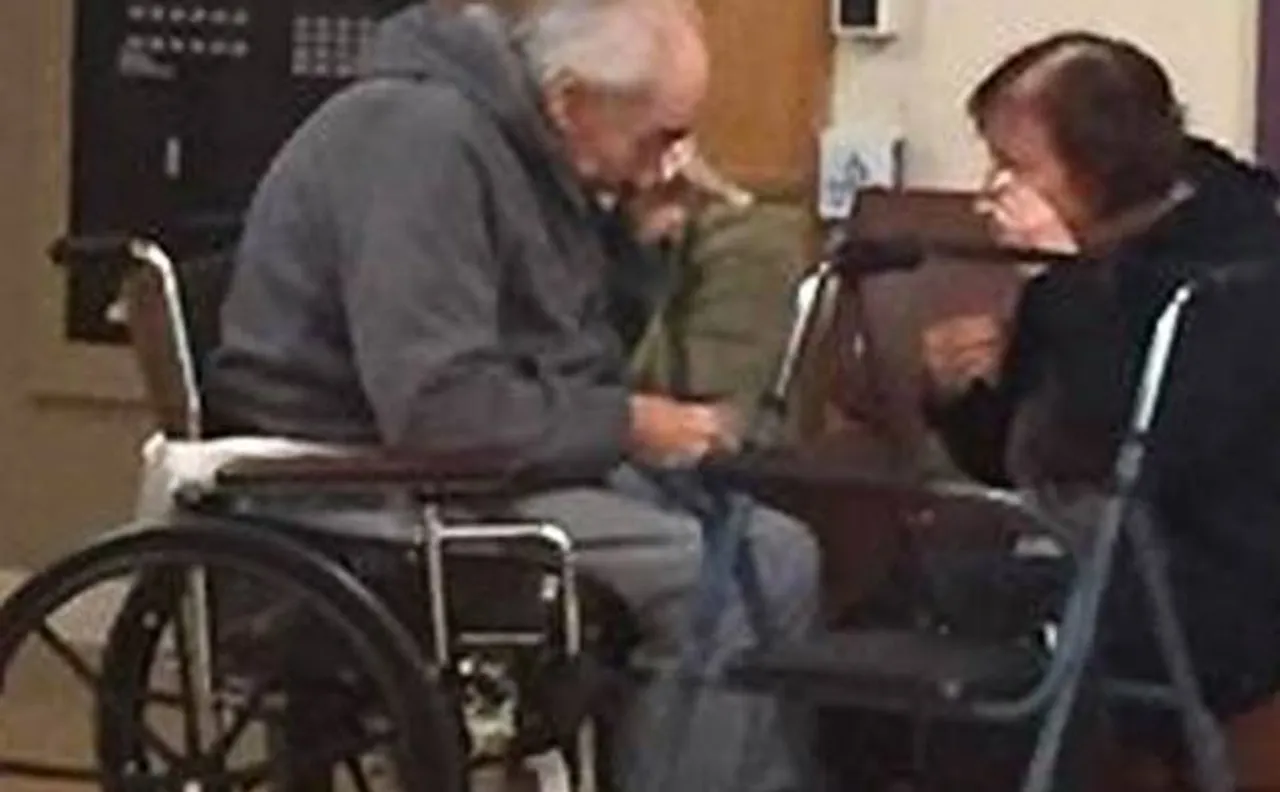 'This is the saddest photo I have ever taken' says grand daughter who captures couple's agonising separation