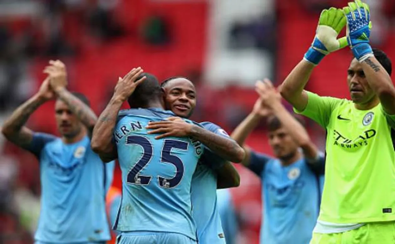 Pep Guardiola claims first derby win as City beat United 2-1