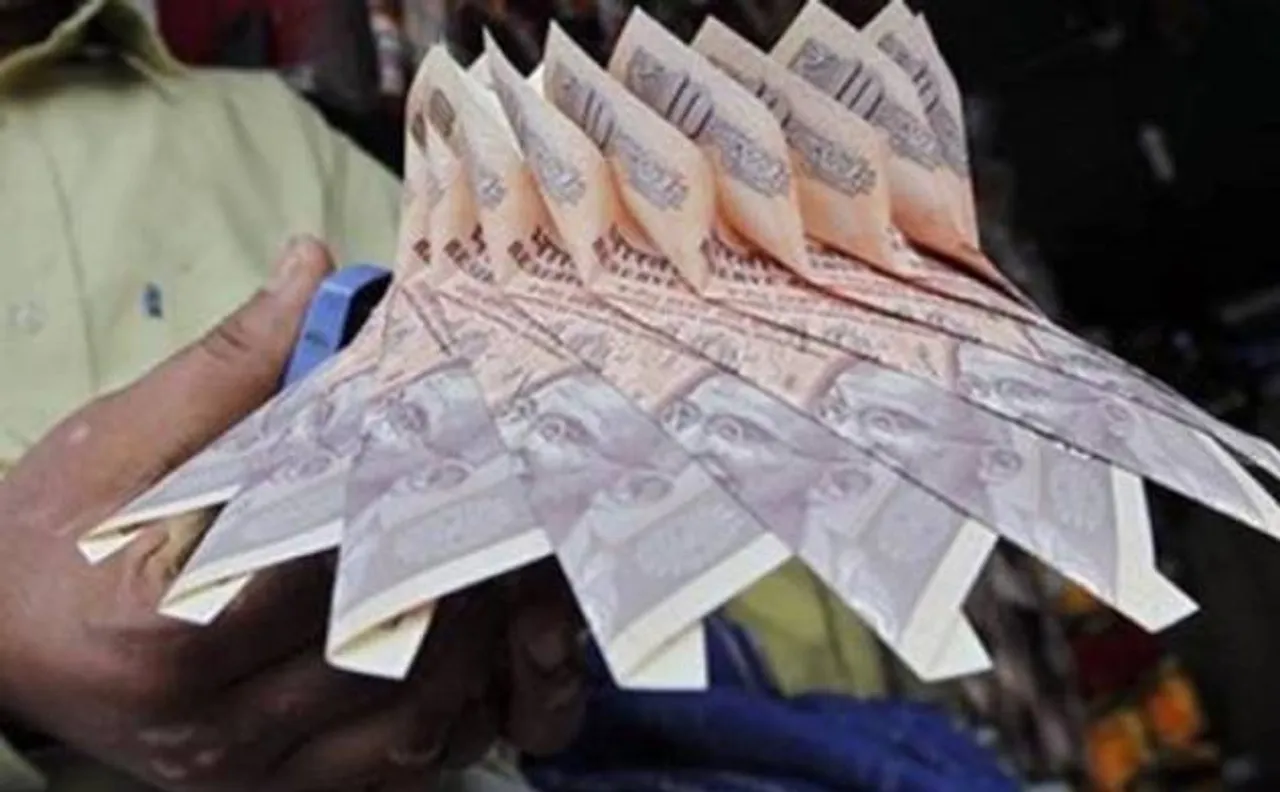 Rupee gains 7 paise to 66.82 against the US dollar