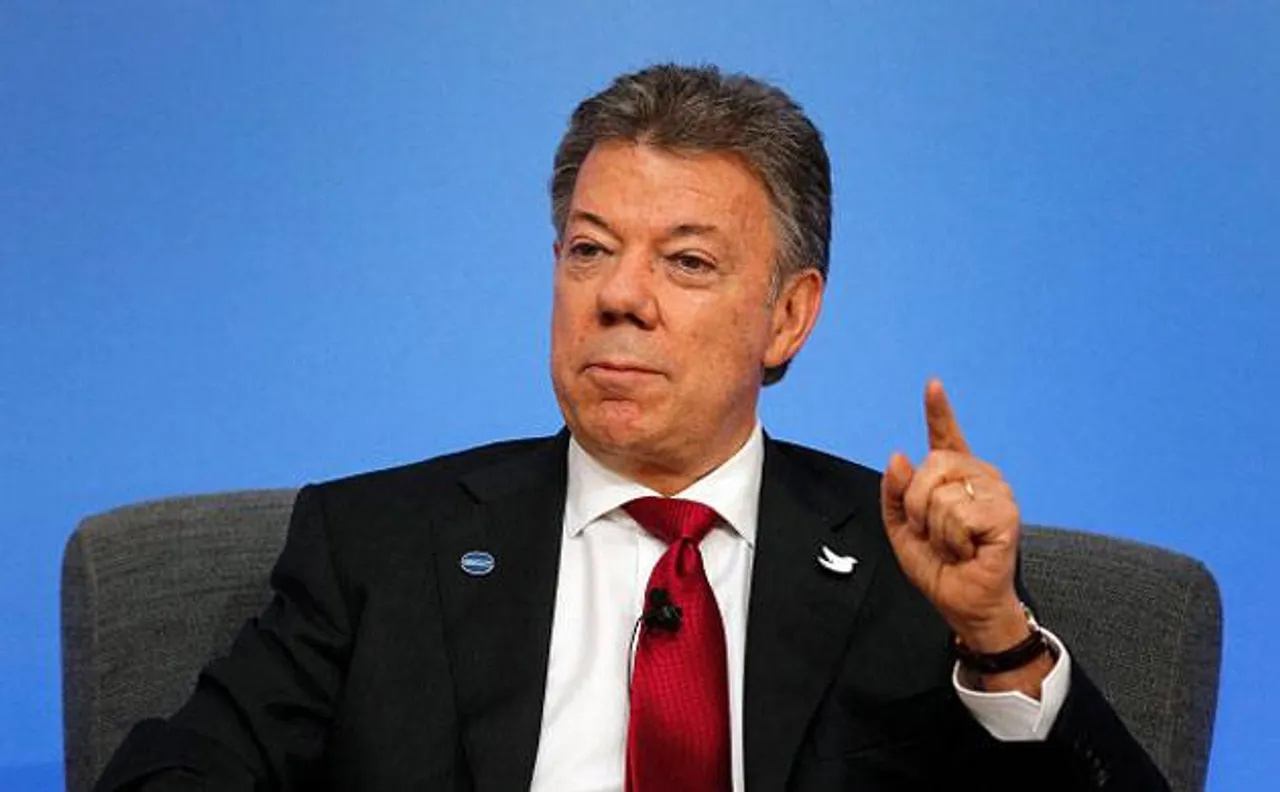 Colombian President Juan Manuel Santos vows to push ahead for peace with leftist rebels after shock defeat in national referendum
