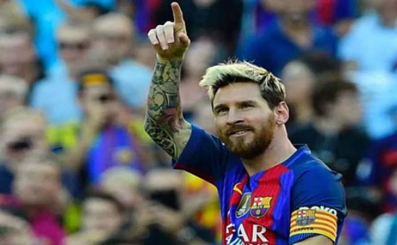 Messi makes a winning return as arch rivals Madrid stay atop