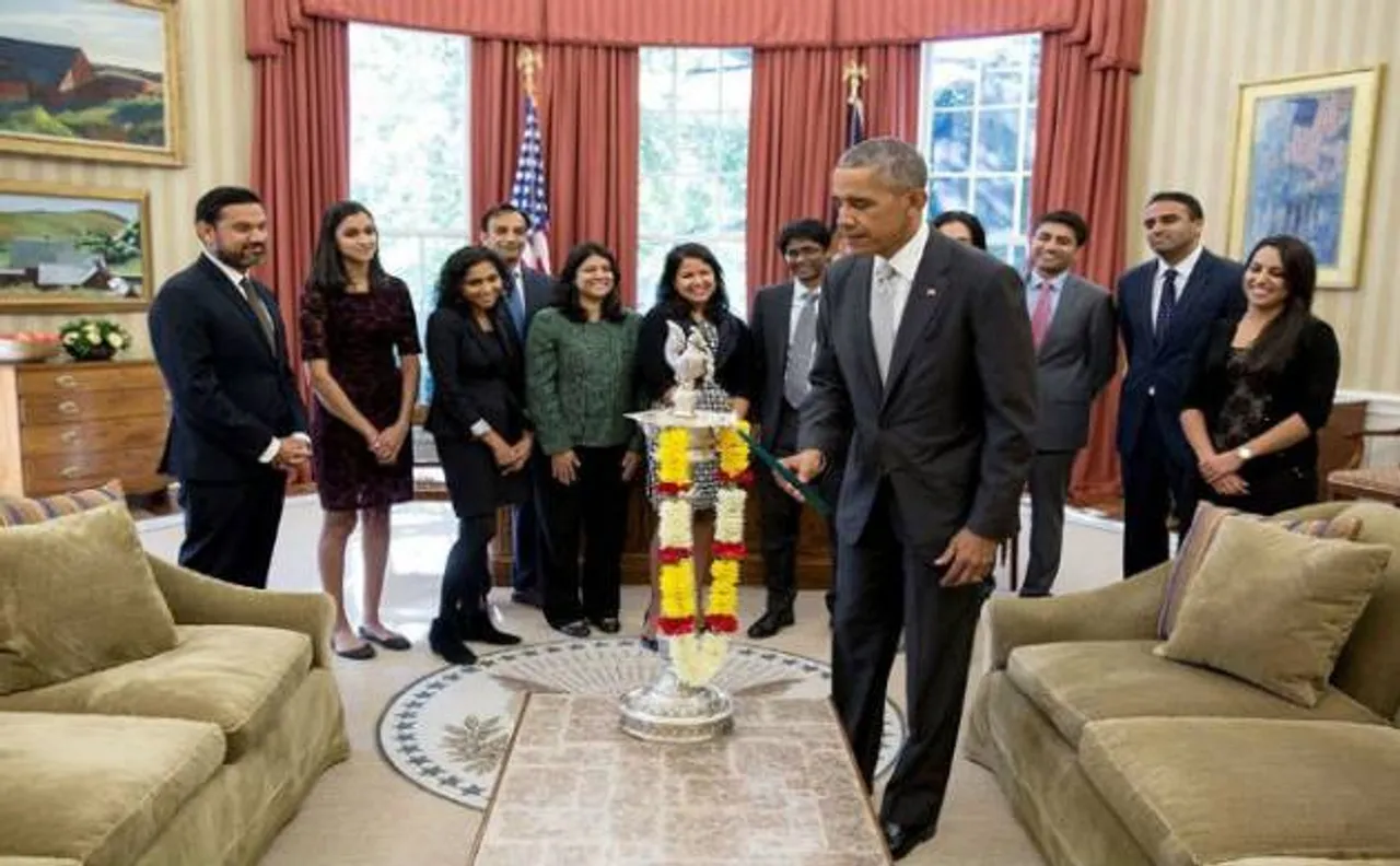 US President Barack Obama celebrates Diwali by lighting first-ever diya in Oval Office of White House
