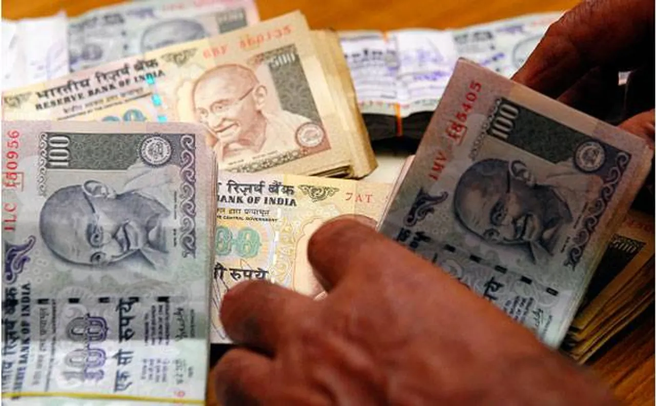 RBI instructs banks to dispense more 100 rupee notes through ATMs