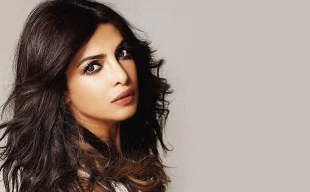 Bollywood Actress Priyanka Chopra poses with puppy in her new Instagram post