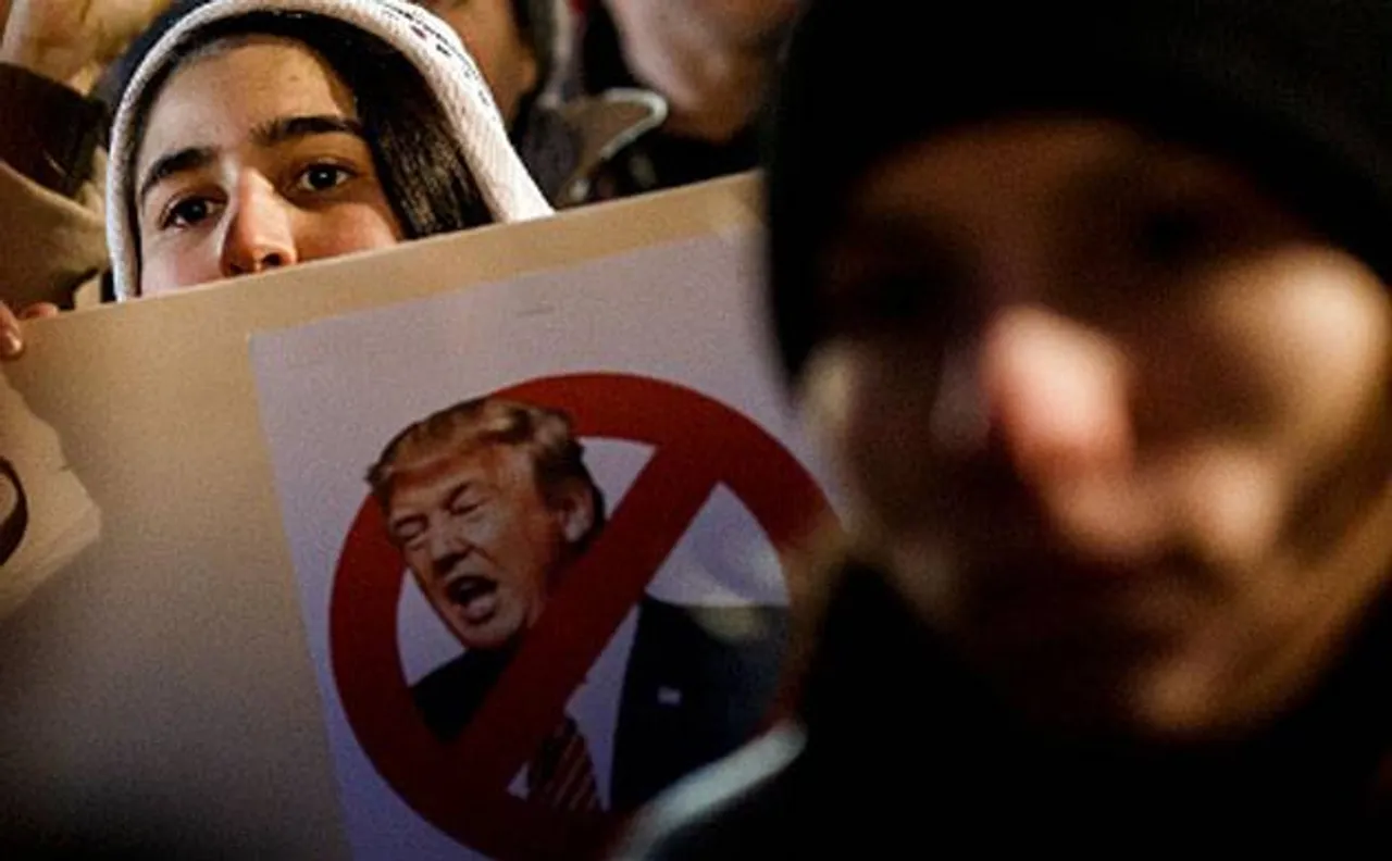Hundreds of people join anti-Trump rally in Paris