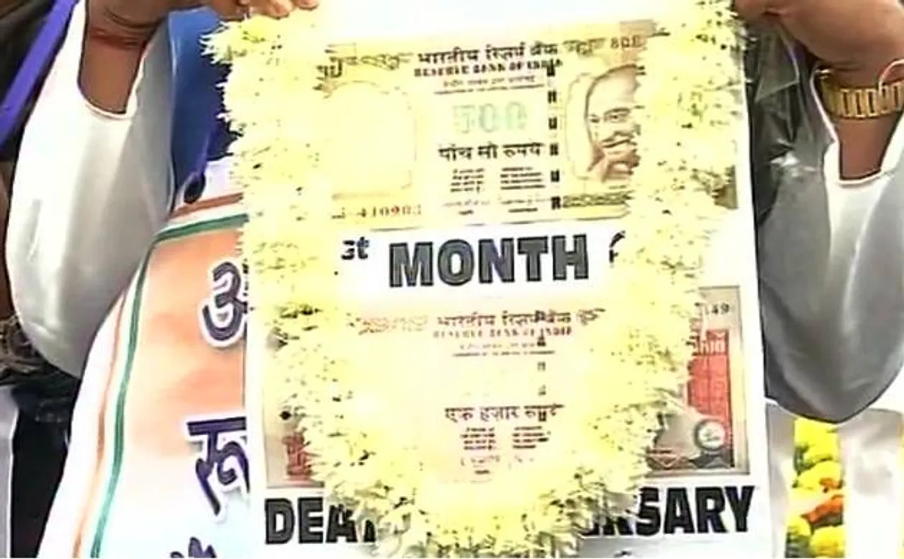 Highlights: Opposition observes black day to mark one month of demonetisation at Gandhi statue inside Parliament premises