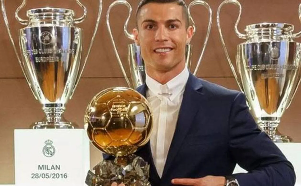 Real's Ronaldo beats Barcelona's Messi to win his 4th Ballon d'Or