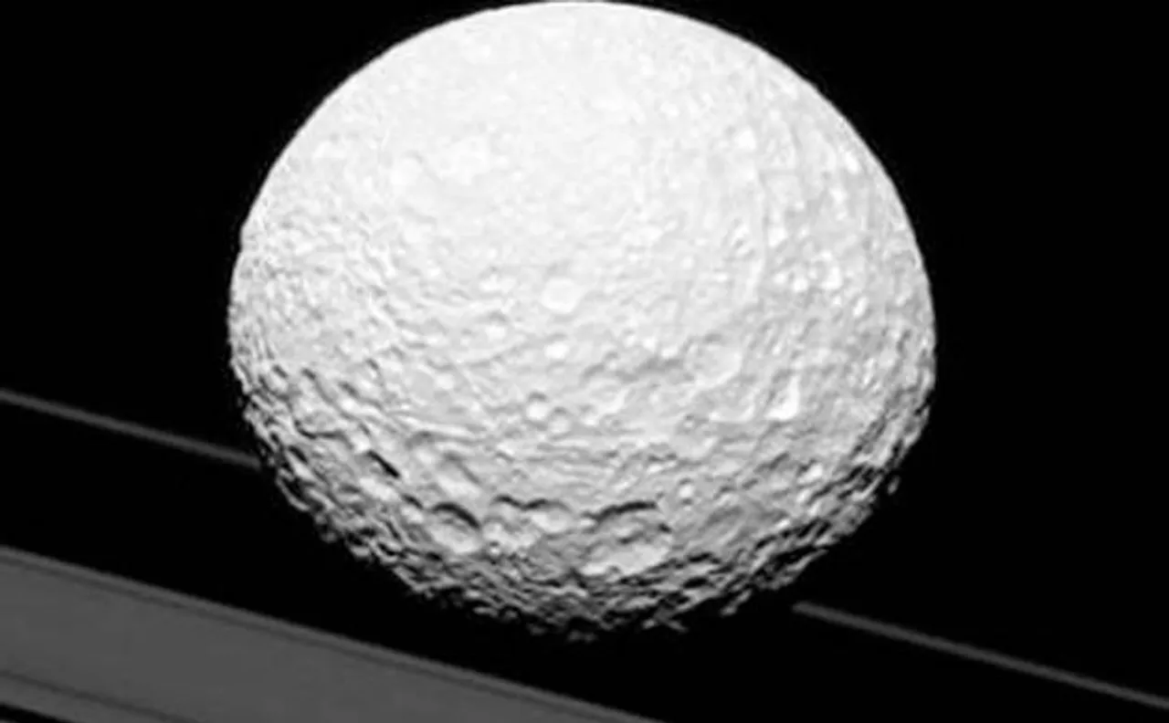 New NASA Cassini picture: Is Saturn's moon Mimas heading for collision with the planet's rings?